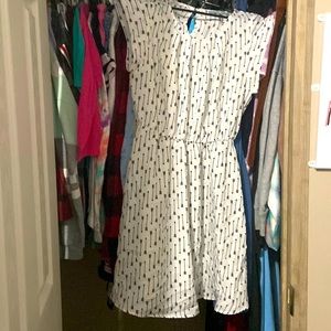 This is a SweetRain white dress with black arrows and it’s a medium.